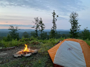 Scenic campsite with a view representing camping trails