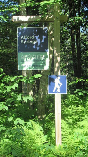 Roadside sign welcomes visitors to Alford Springs