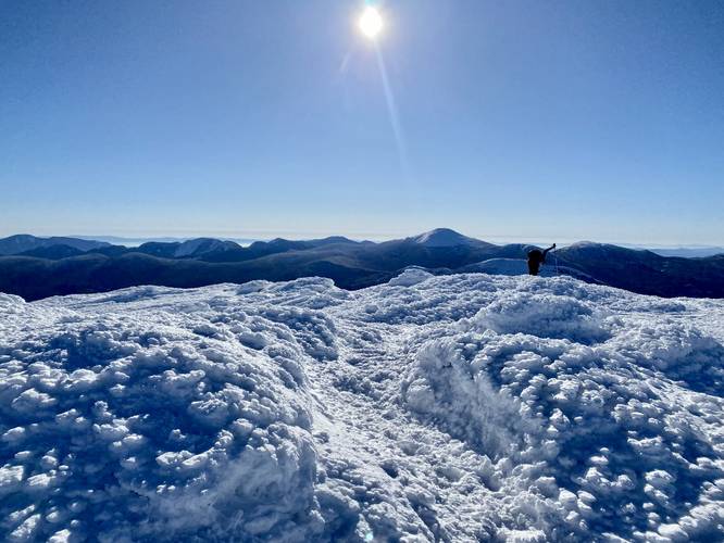 Cresting the summit of Algonquin Peak with Mt. Marcy in the distance