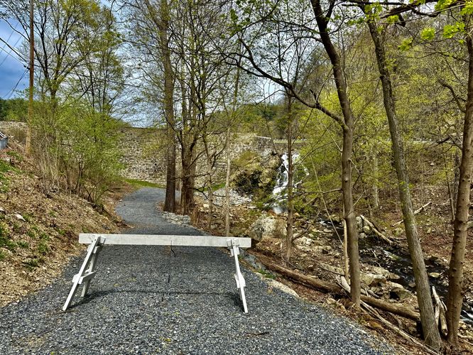 Gated service road leads to the 30-foot tall Antietam Lake Falls