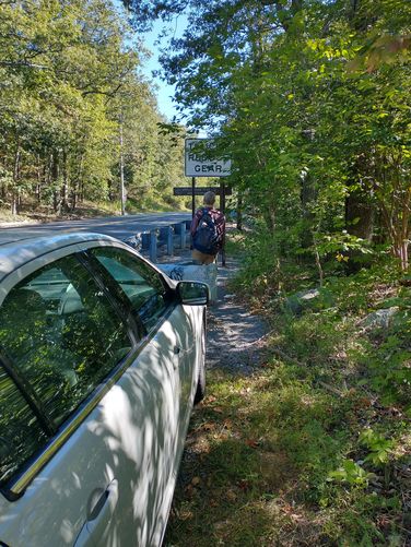 We found a spot just to the side of the road near the guardrail to park.