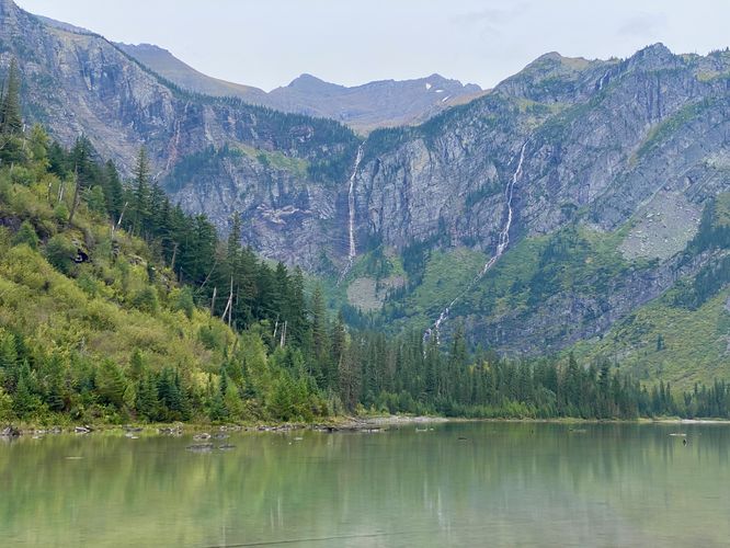 View of Avalanche Lake and its massive waterfalls