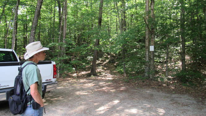 Tamposi Trail at far end of parking area