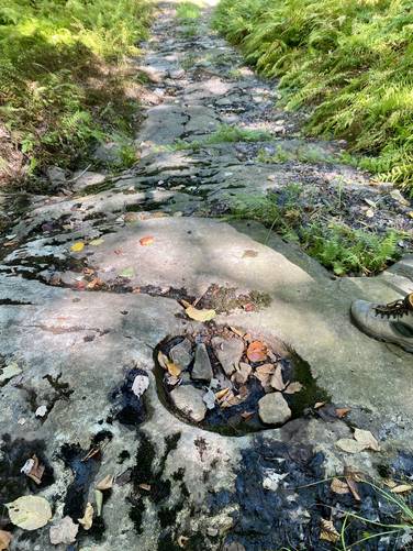 Pothole erosion in the bedrock atop Bartlett Mountain