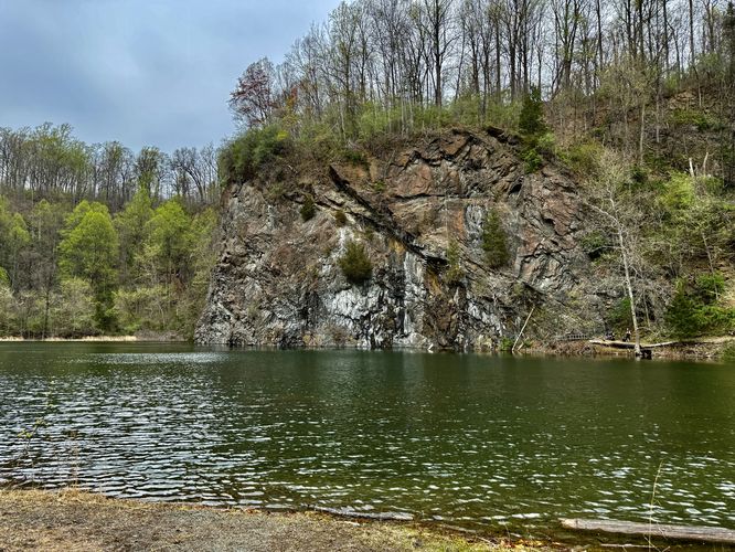 View of cliffs and quarry lake at the Birdsboro Climbing Quarry