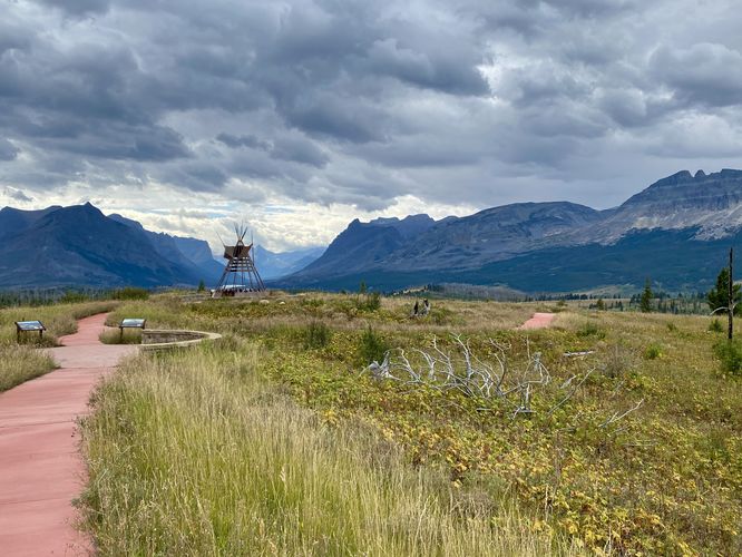 Universally-accessible trail with views of the Blackfeet Lodges and surrounding mountains