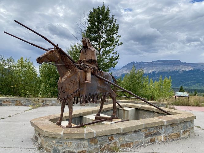Metal statue of a Blackfoot horse rider