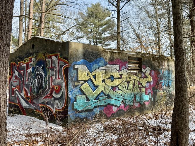 Abandoned concrete structure with graffiti