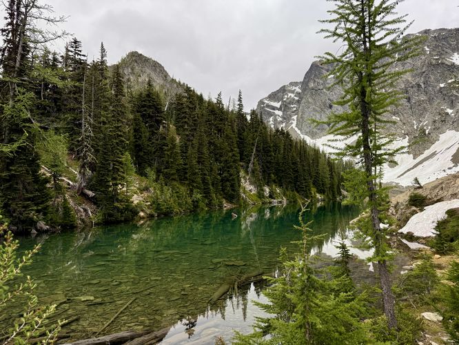 Glassy, turquoise-tinted waters of Blue Lake