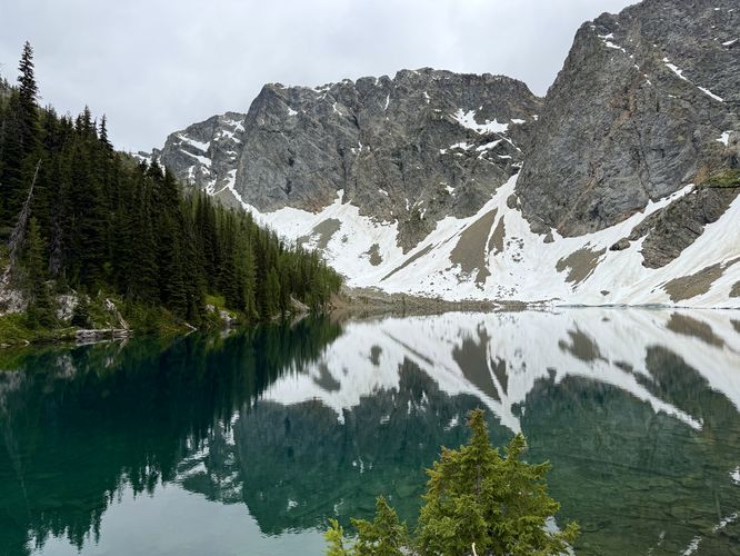 Vibrant blue hues of Blue Lake below alpine peaks