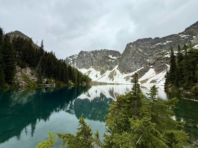 View of vibrant blue hues of Blue Lake with surrounding alpine peaks