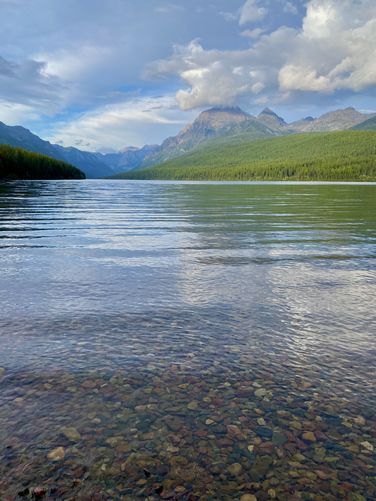 Colorful stones in Bowman Lake's water