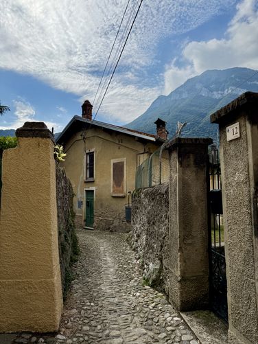 Cobblestone streets of Via Forno on the hike to Cascata di Tobi