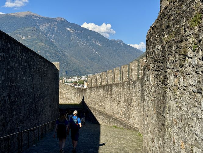 Alps stand tall above Castel Grande as seen from the inner gateway