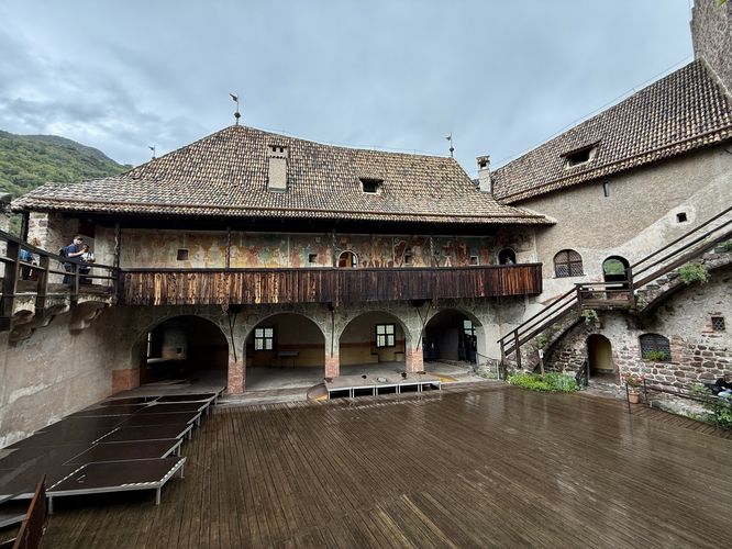 View of Castel Roncolo's inner courtyard and Summer Palace with frescoes