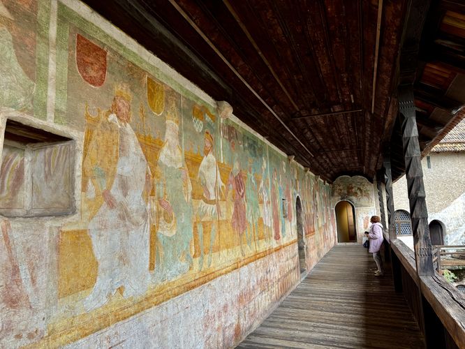 Frescoes line the Summer Palace's exterior of Schloss Runkelstein
