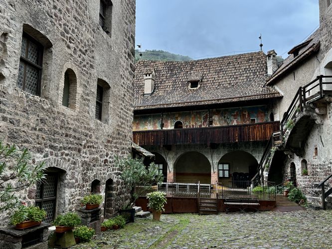 A view of Castel Roncolo's courtyard from below