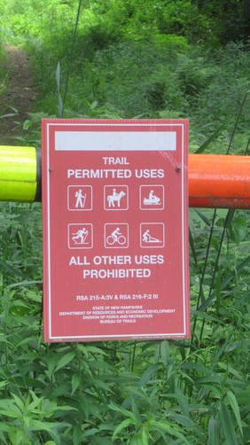 Trail use sign posted on Rail trail gate