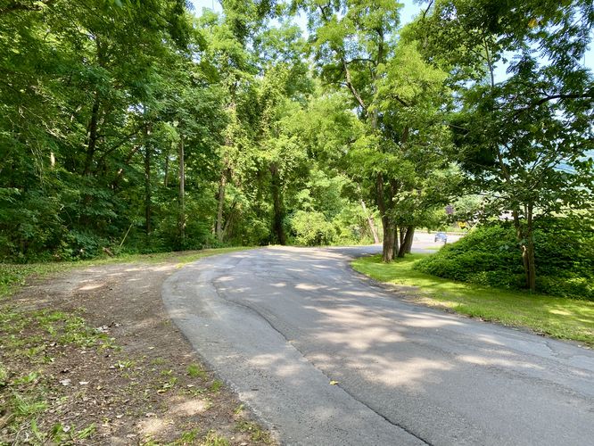 Hike the road back to parking