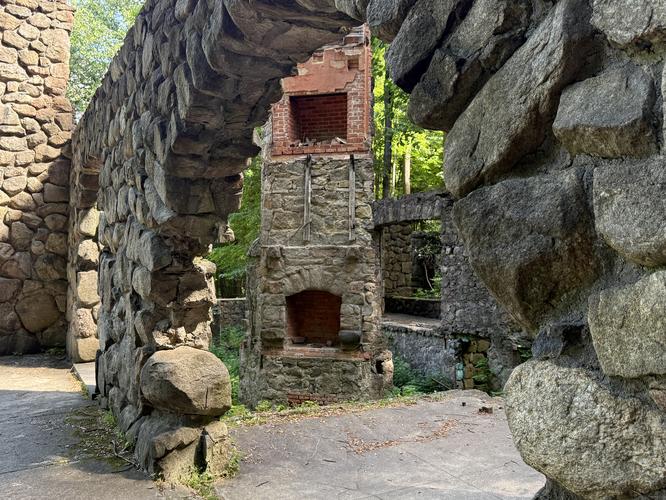 Fireplaces stand tall in the Cornish Estate mansion ruins