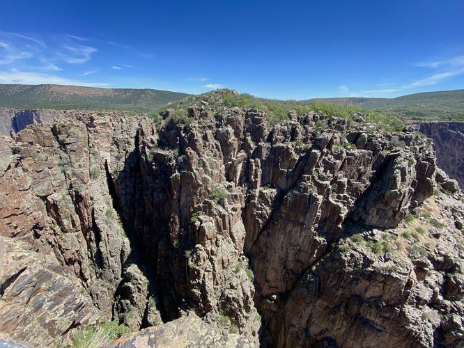 View into Black Canyon’s rugged cliffs from the Cross Fissures View