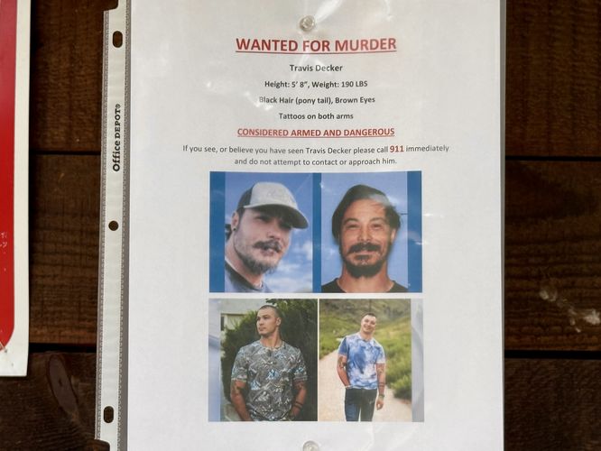 Another wanted for murder sign for Travis Decker