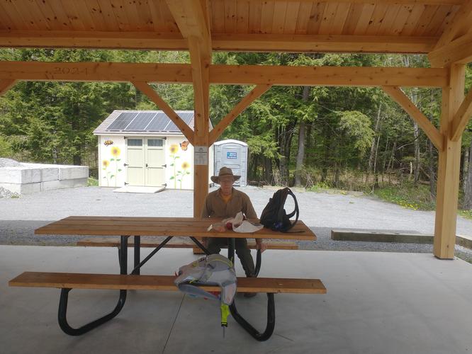 Timber frame pavilion with picnic tables 