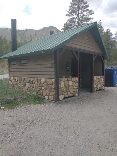 Restrooms across parking area