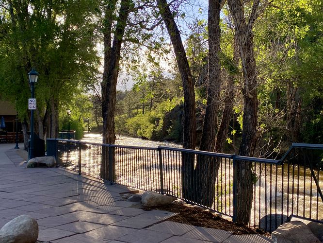 Big Thompson River roars by the Estes Park Riverwalk