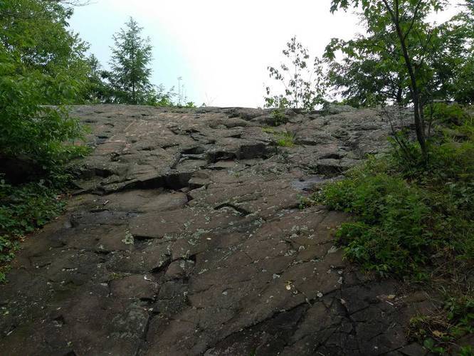 Climb uphill along slick rock