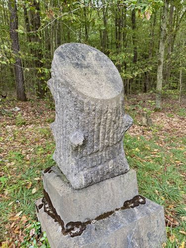 Beautiful headstone, shaped like a cross-cut of a tree