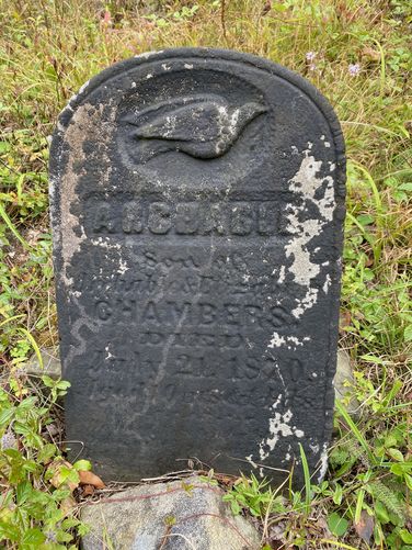 Very old weather-worn headstone