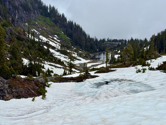 Blue hues of the frozen over Austin Pass Lake