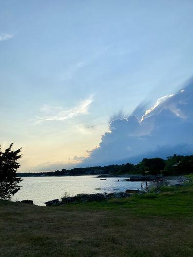 View of the bay with a storm cloud overhead