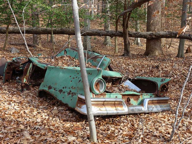 Rusty abandoned car