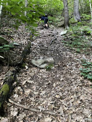 Dustin Reihl ascending the steep hill to Turkey Path