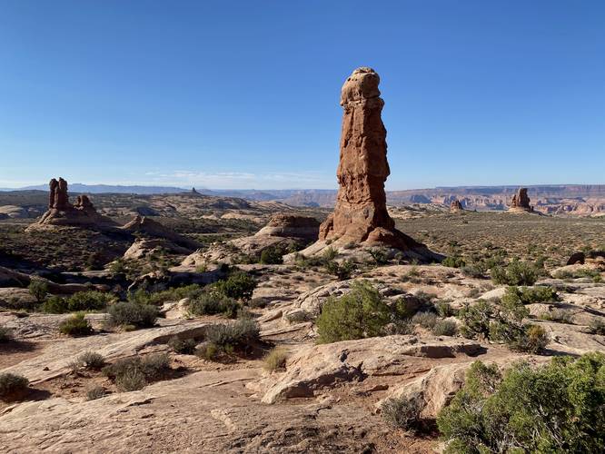 Large rock spires sit outside the Garden of Eden in Arches National Park
