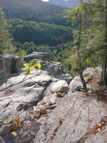 The waterfall is hidden in the rocks