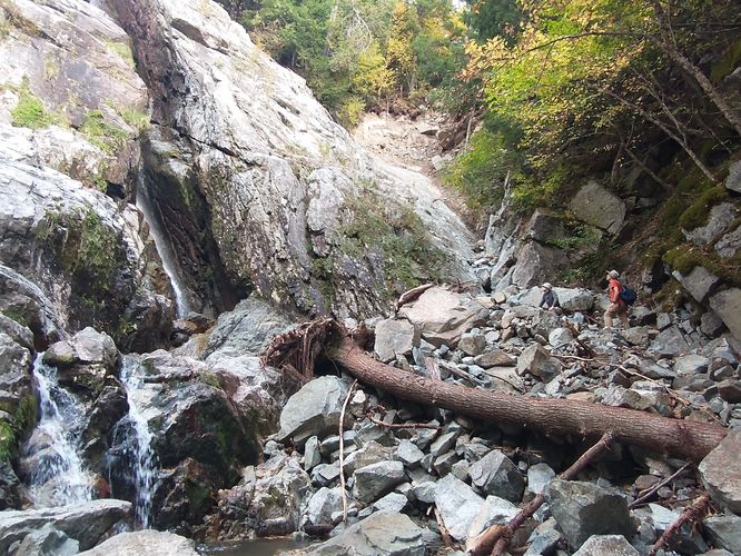 A bit of rock scramble will give a better view of the waterfall 