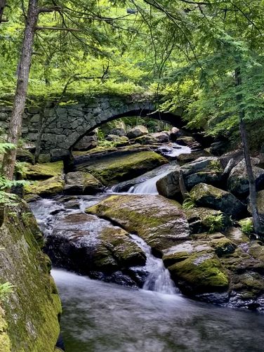 Gleason Falls and scenic stone bridge - long exposure