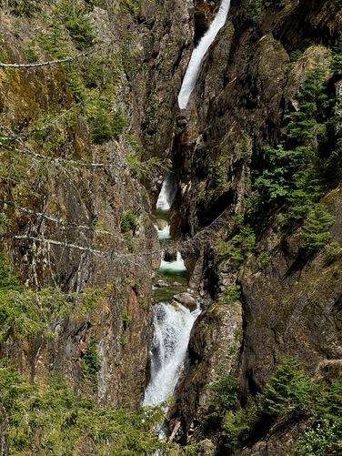 Portrait view of cascades within Gorge Creek Falls at North Cascades National Park