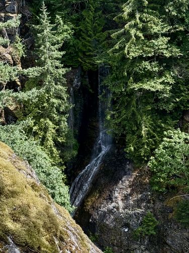 Portrait view of a waterfall cascading into Gorge Creek