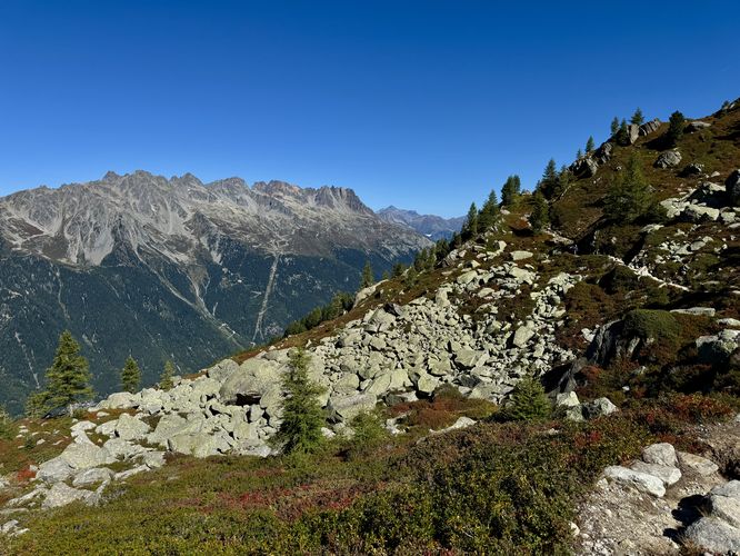 Boulder field view with a backdrop of Aiguilles Rouges (Red Needles) massif