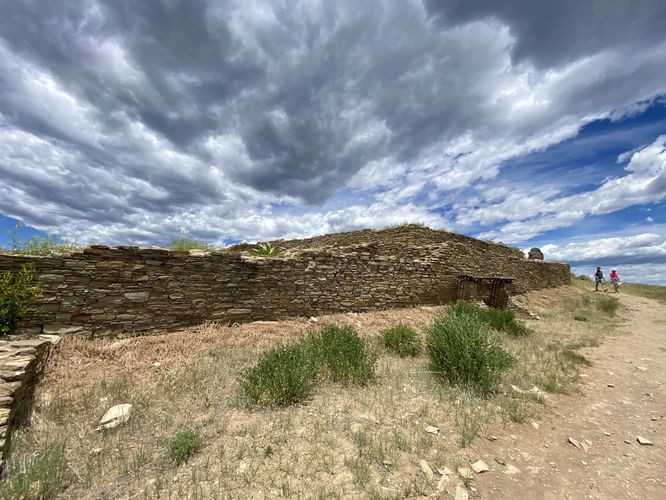 Wide angle view of the Great House stone wall at Chimney Rock