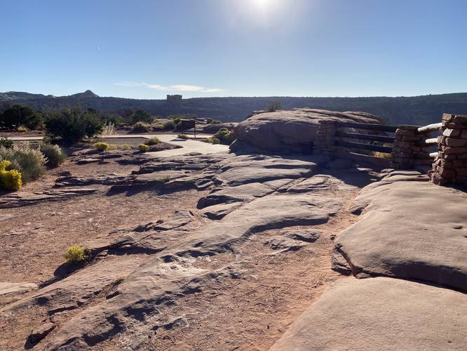 Universal access pathway ends, dirt/rock path begins