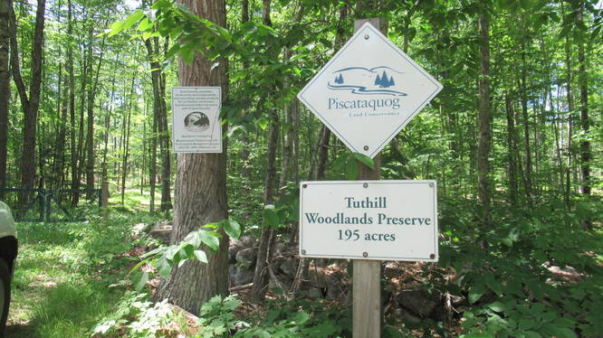 Trailhead sign at parking area