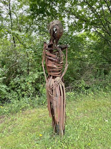Metal skeleton sculpture