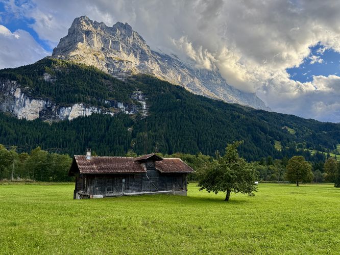 Scenic Eiger view with a rustic barn
