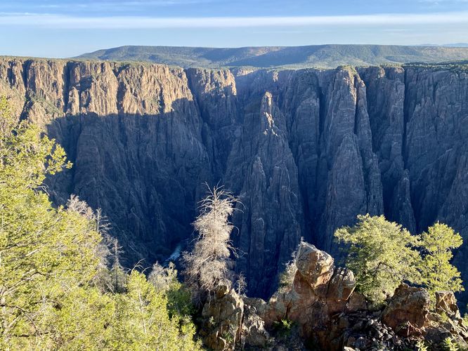 Early morning light illuminates the Black Canyon