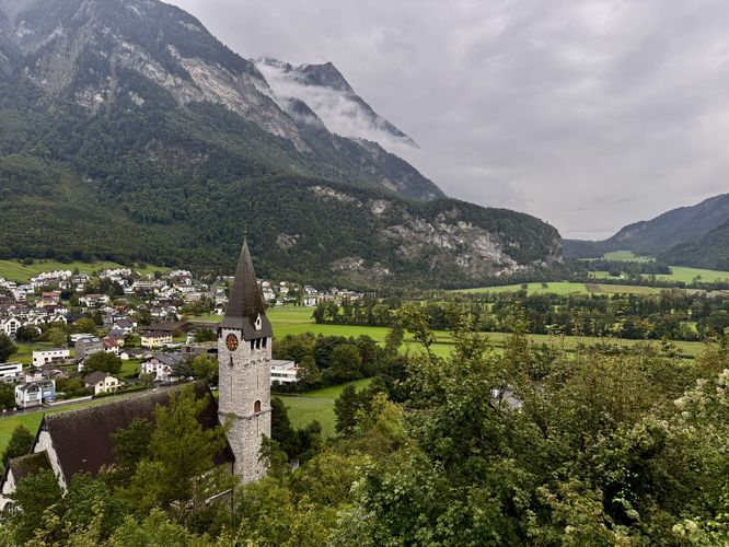 View of Balzers and towering Alps from the castle terrace